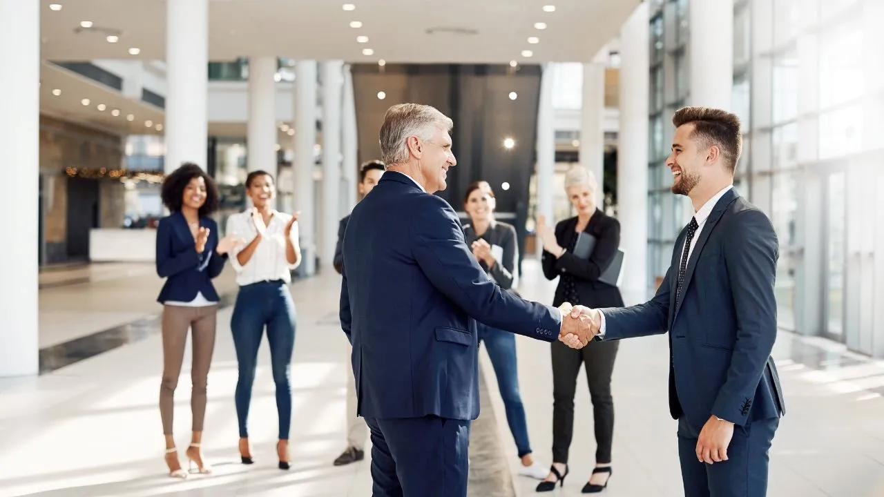 Businesswoman happily working with e-commerce partner in an office